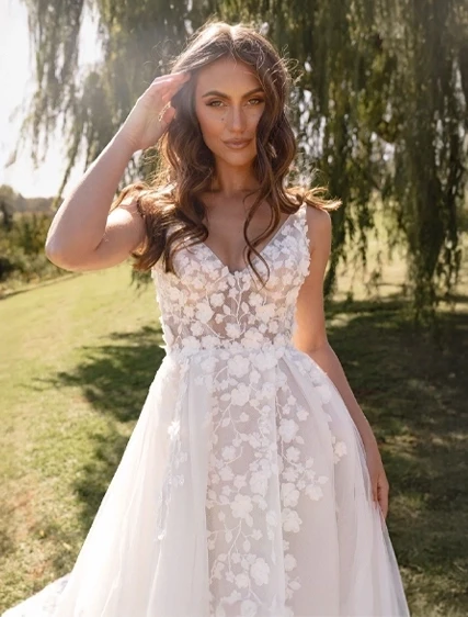 Model wearing a Madi Lane gown