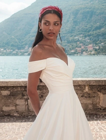 Model wearing an Madison James gown